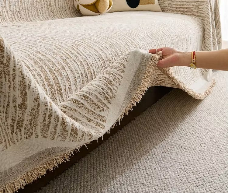 Jeté de canapé beige bien fini