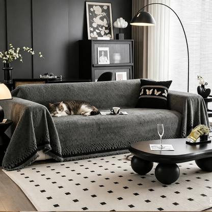 Jete de canape gris chat dort